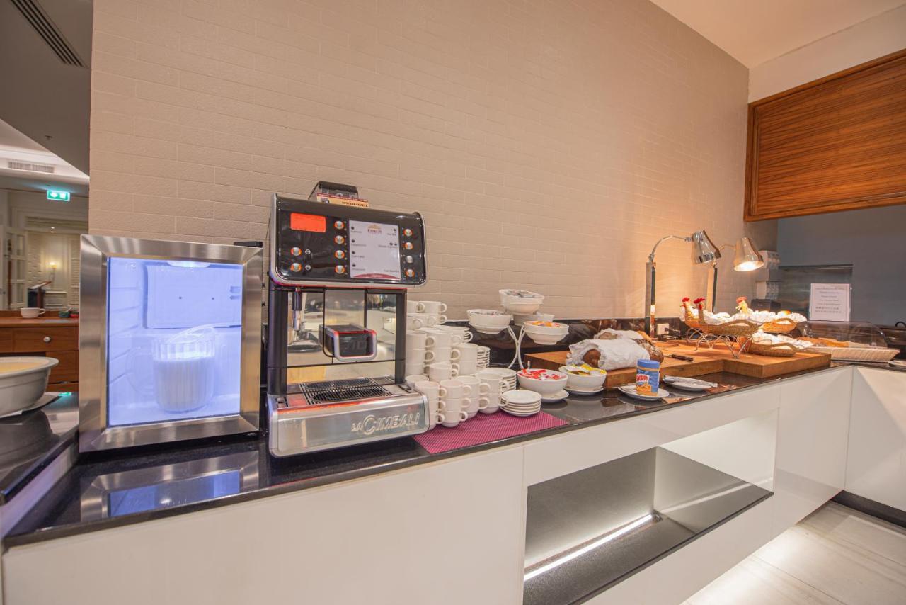 The Empress Premier Chiang Mai - Sha Extra Plus Exterior photo A coffee machine in a hotel